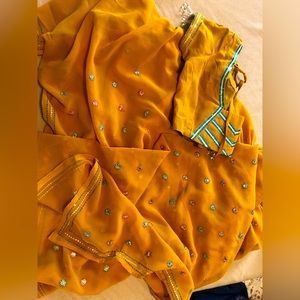 Like new indian party wear saree with blouse.